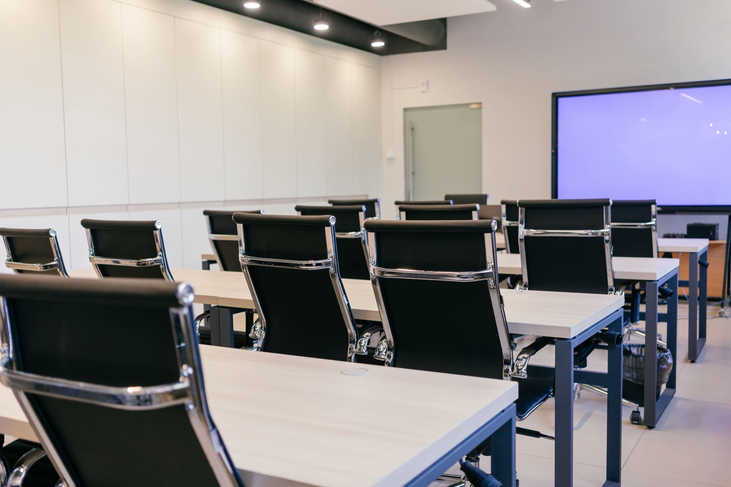 Participants in the academy's modern seminar room
